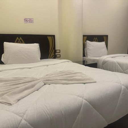Pyramids And Sphinx Hotel Kafret el-Gabal Extérieur photo