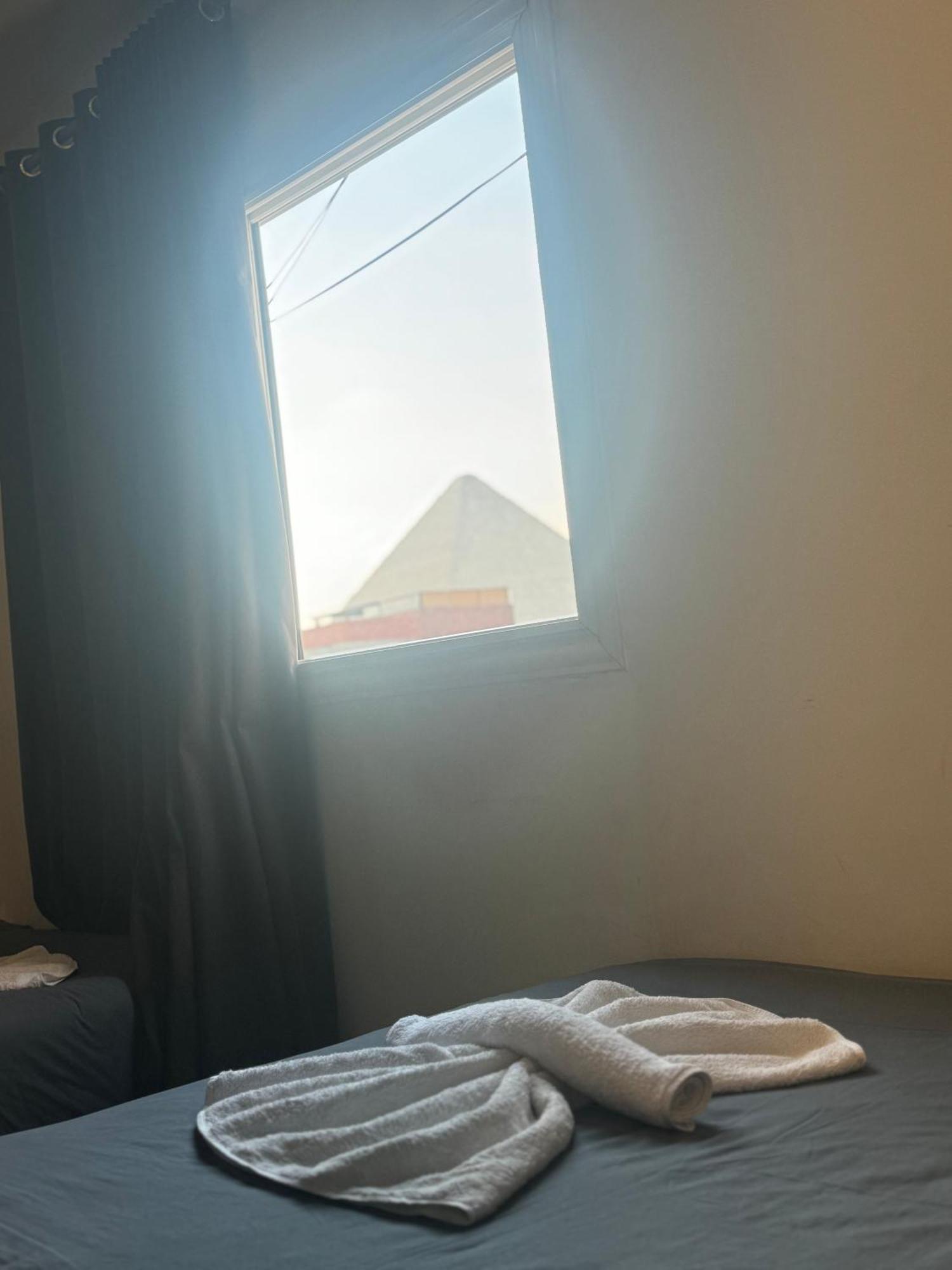 Pyramids And Sphinx Hotel Kafret el-Gabal Extérieur photo