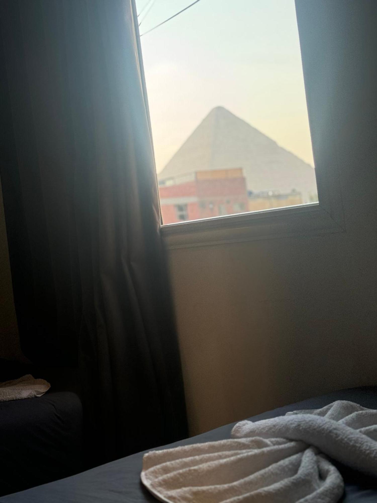 Pyramids And Sphinx Hotel Kafret el-Gabal Extérieur photo